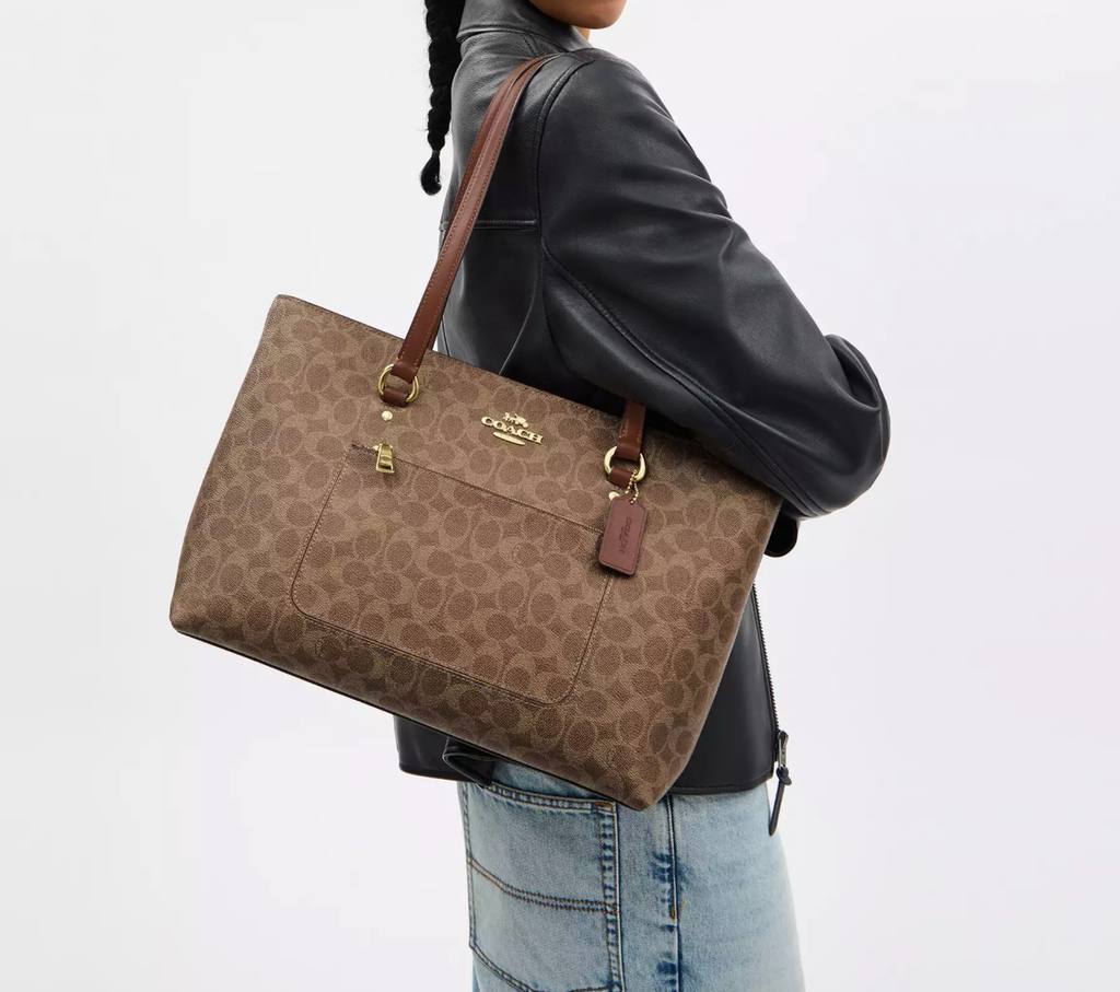 حقيبة "كوتش" (Coach) توت الكلاسيكية - تصميم Signature Canvas الفاخر
