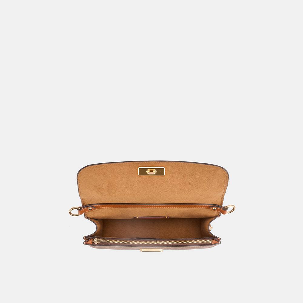 Coach Signature & Horse and Carriage Flap Bag - A Timeless Classic