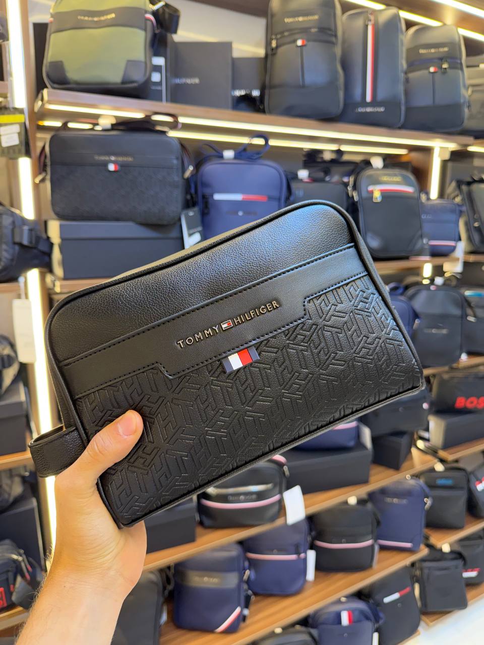 Tommy Hilfiger Polished Black Men’s Pouch With Embossed Flag Detail