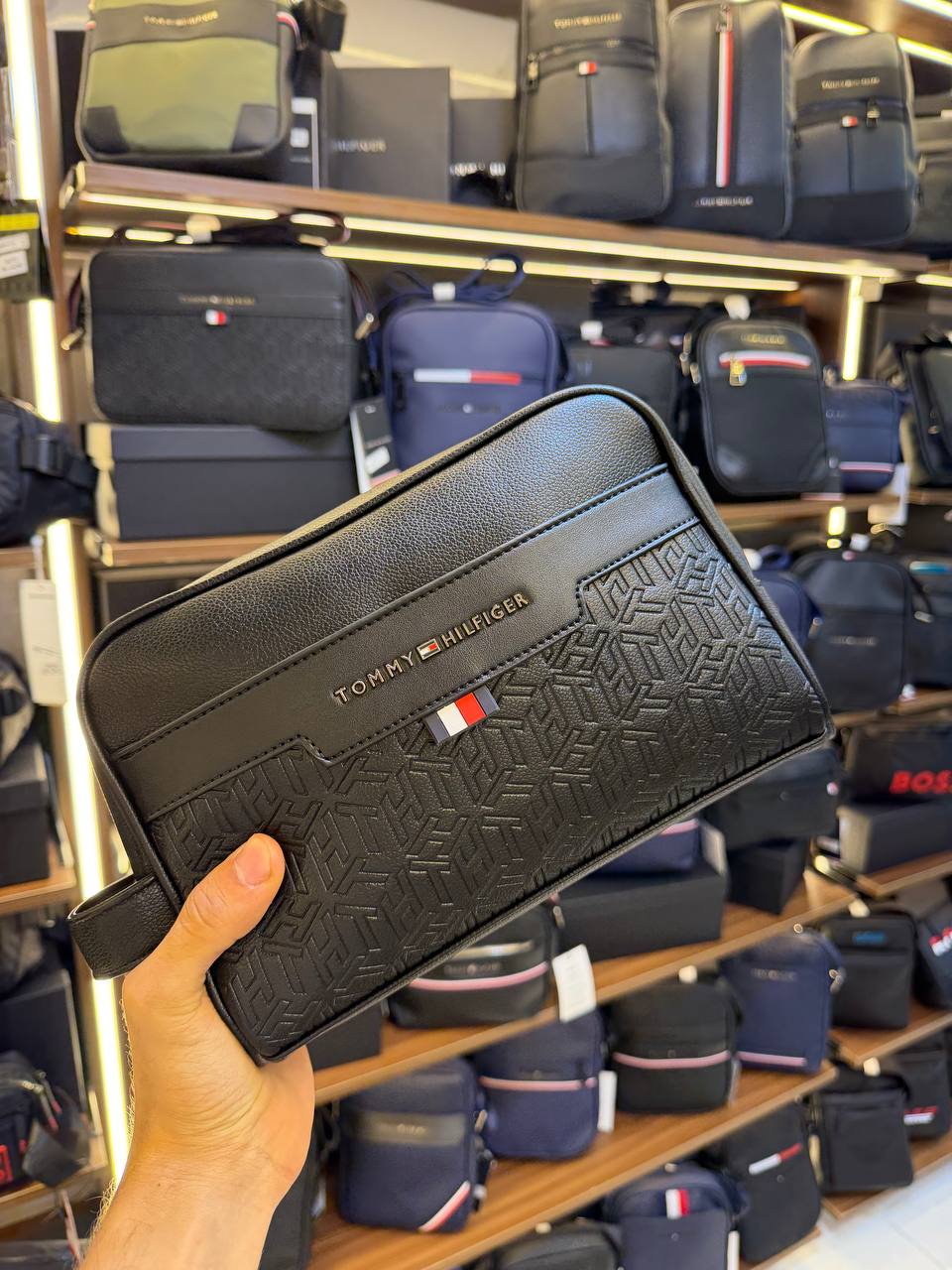 Tommy Hilfiger Polished Black Men’s Pouch With Embossed Flag Detail