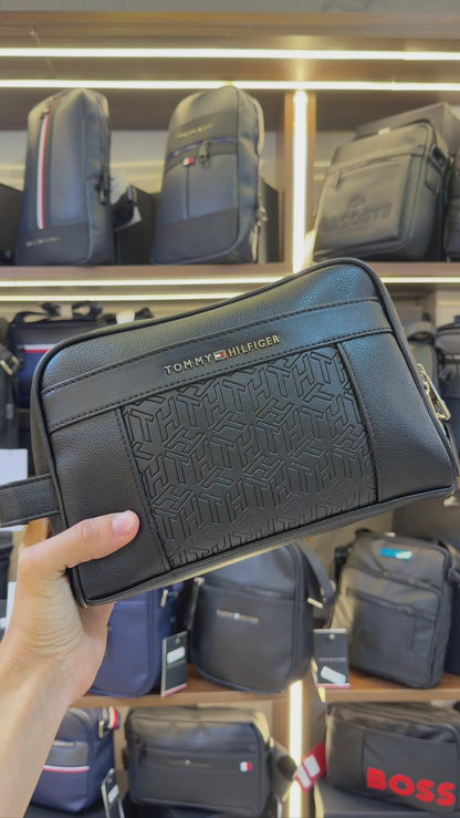 Tommy Hilfiger Polished Black Men’s Pouch With Monogram Pattern