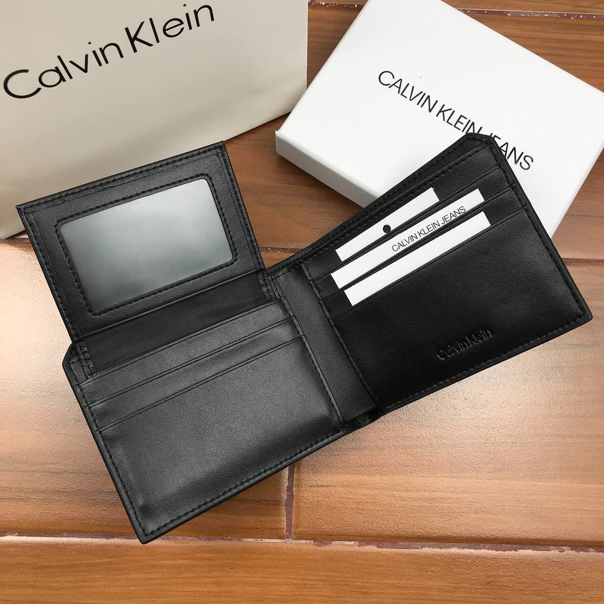 Calvin Klein  All-Over Monogram Black Leather Wallet