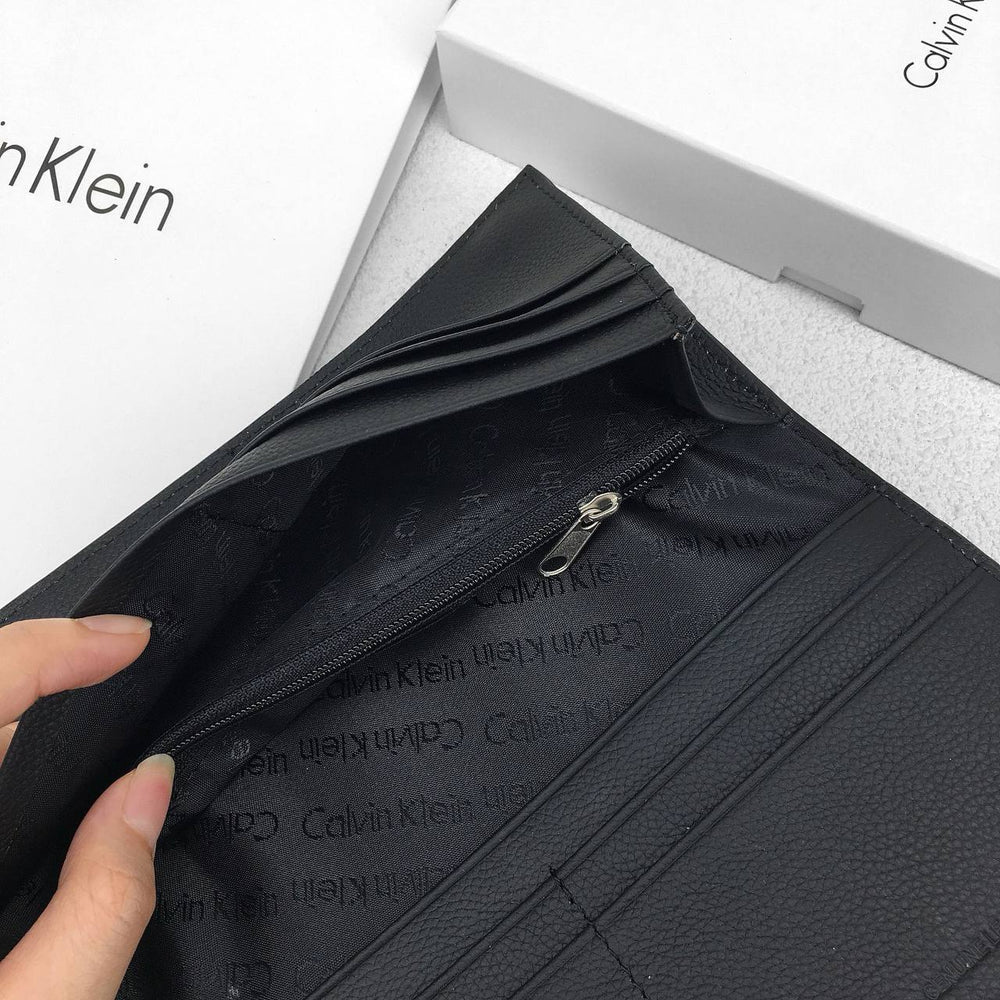 Calvin Klein Unisex Embossed Logo Around Long Wallet