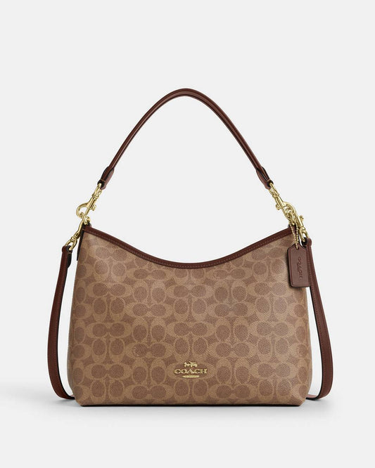 حقيبة "كوتش" (Coach) هوبو الكلاسيكية - تصميم Signature Canvas بنقشة المونوغرام الأيقونية