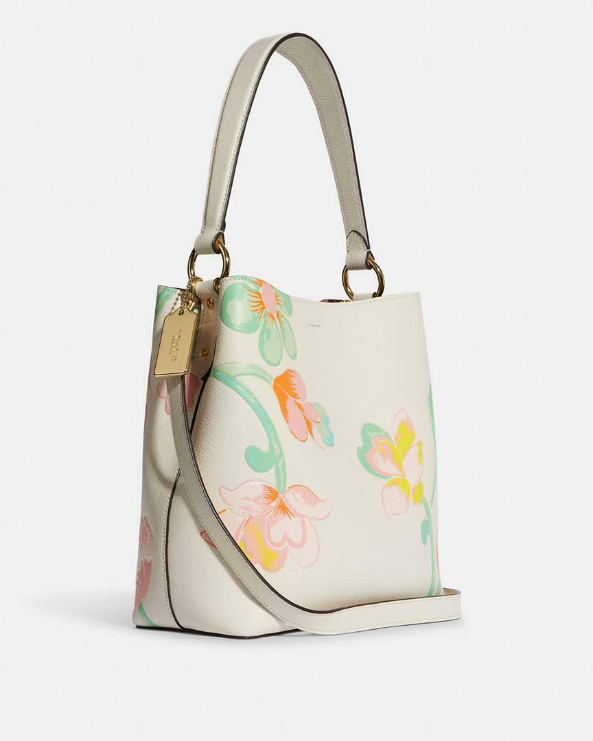 حقيبة "كوتش" (Coach) باكت (Bucket Bag) - بتصميم الزهور الربيعية الأنيق باللون الكريمي