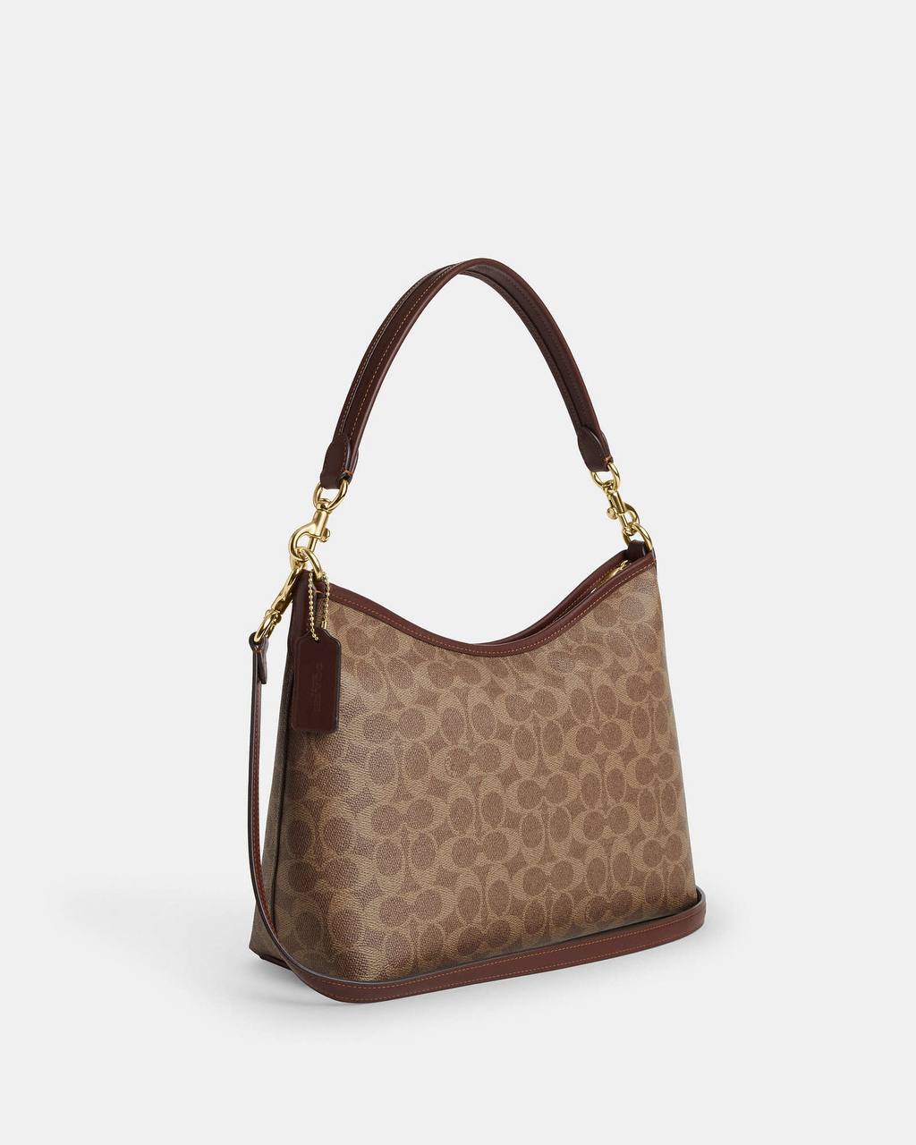 حقيبة "كوتش" (Coach) هوبو الكلاسيكية - تصميم Signature Canvas بنقشة المونوغرام الأيقونية