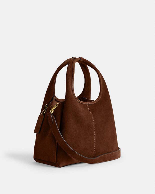 شنطة كوتش (Coach) الأصلية من الشمواه الفاخر – بتصميم عصري أنيق
