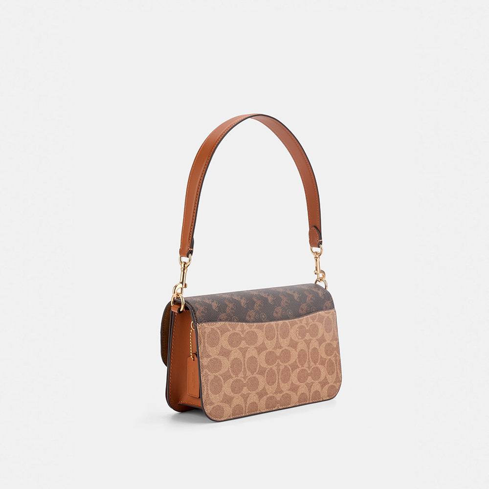 Coach Signature & Horse and Carriage Flap Bag - A Timeless Classic