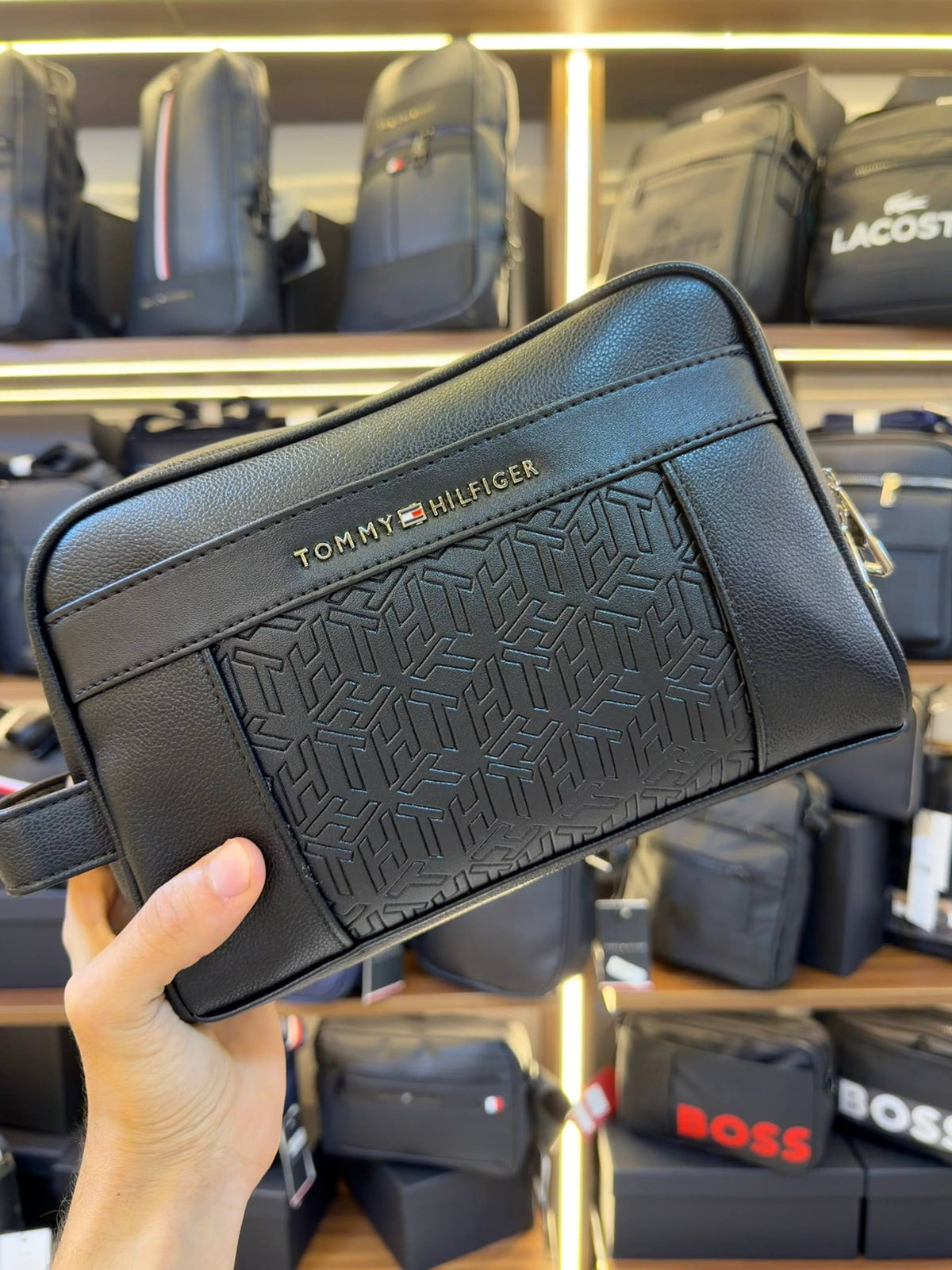 Tommy Hilfiger Polished Black Men’s Pouch With Monogram Pattern