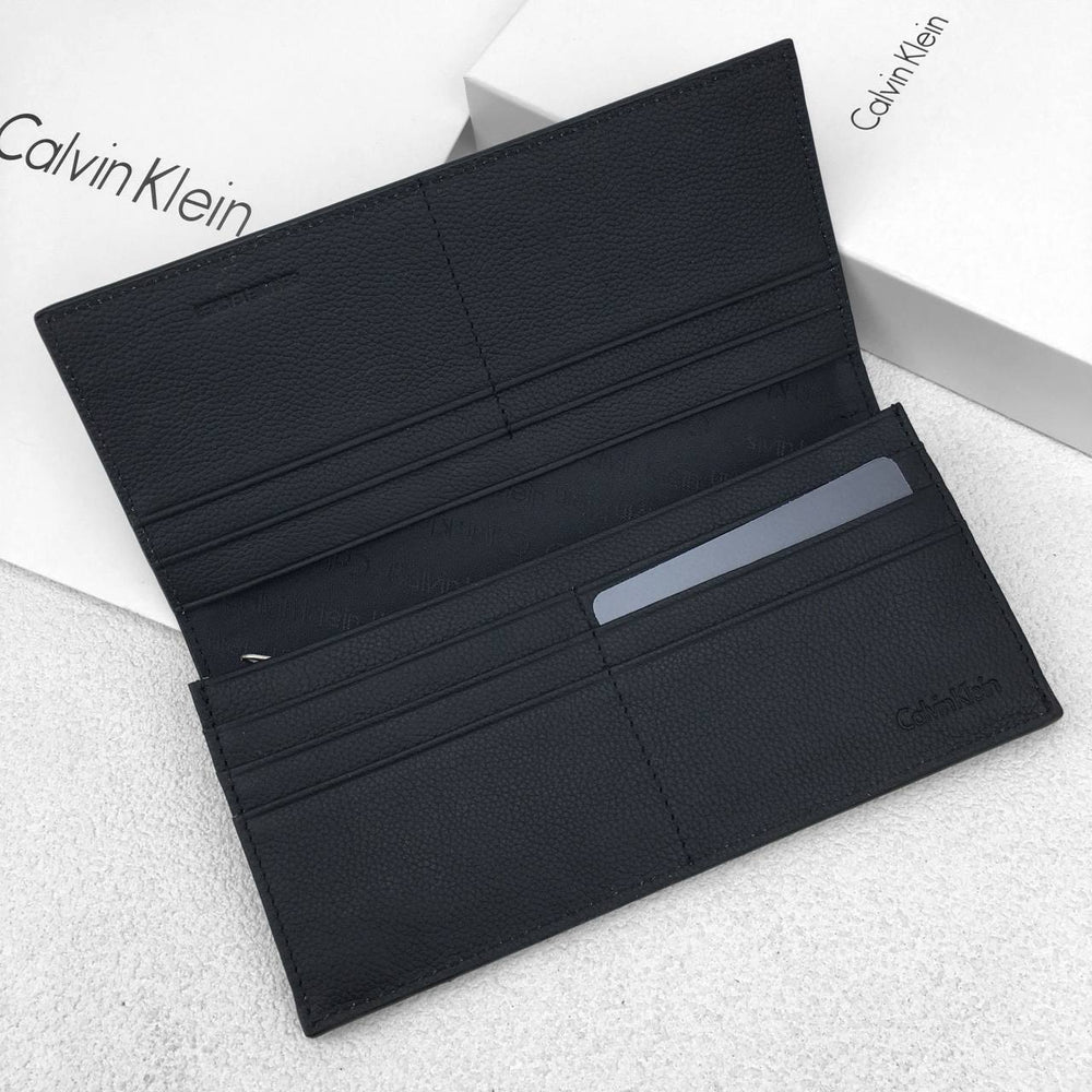Calvin Klein Unisex Embossed Logo Around Long Wallet
